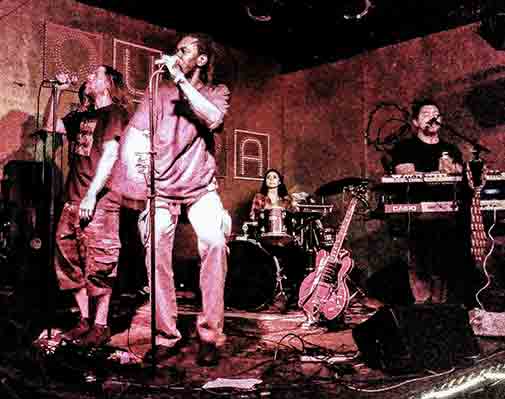 Izmskzm on stage at Long Beach.